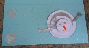 Tarjeta de navidad con muñeco de nieve